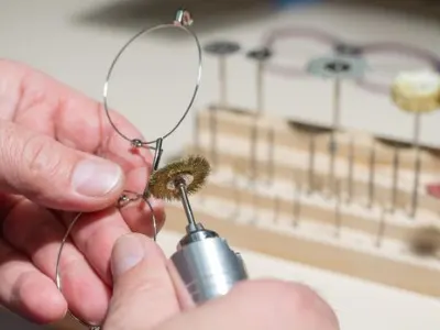 Optician Setting up a pair of glasses